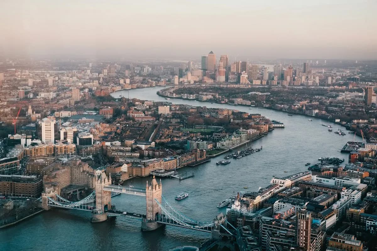 River Thames winding through London with Tower Bridge in the foreground