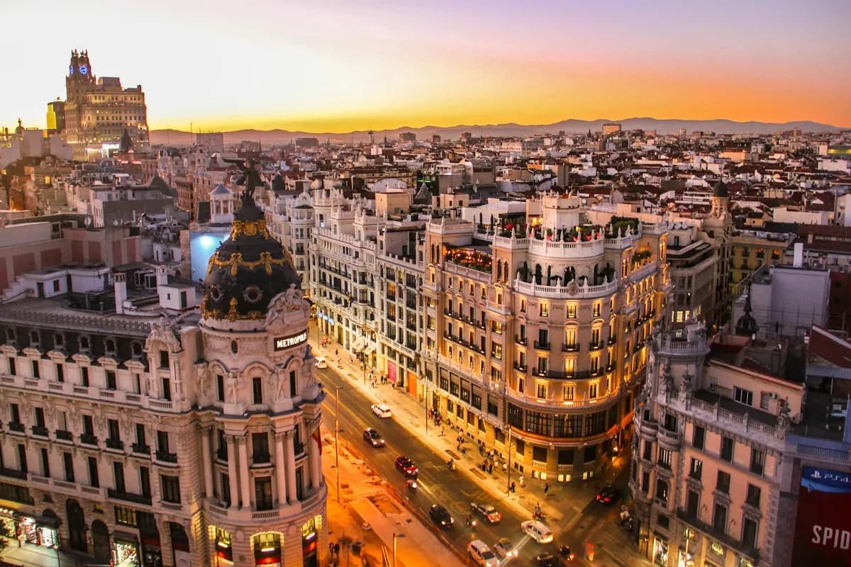 Madrid’s Gran Vía and the Metrópolis building at sunset