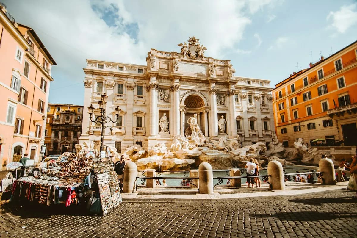 Visitors and marble sculptures at Rome’s Trevi Fountain